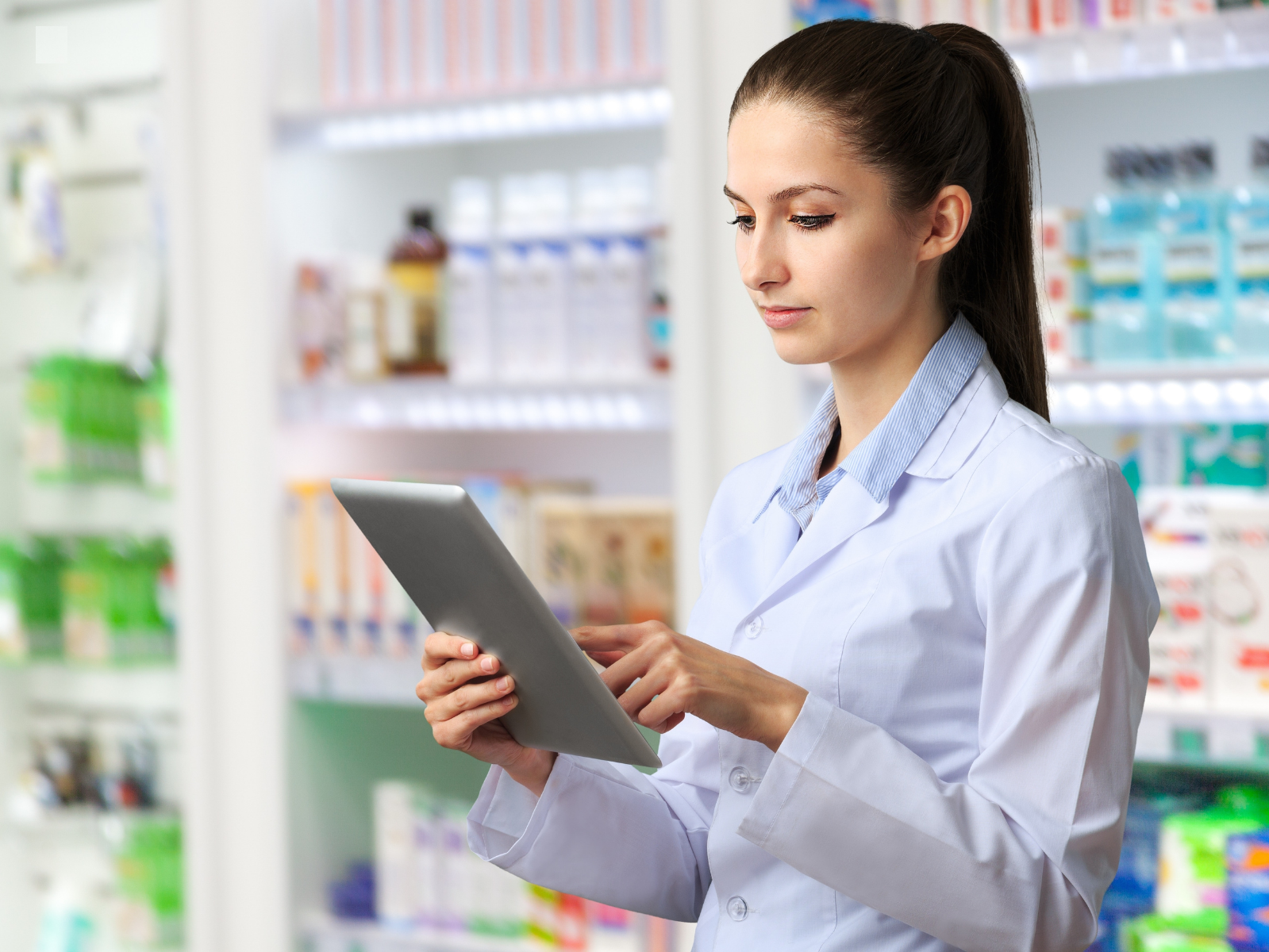 Healthcare professional accessing personalized member portal on tablet