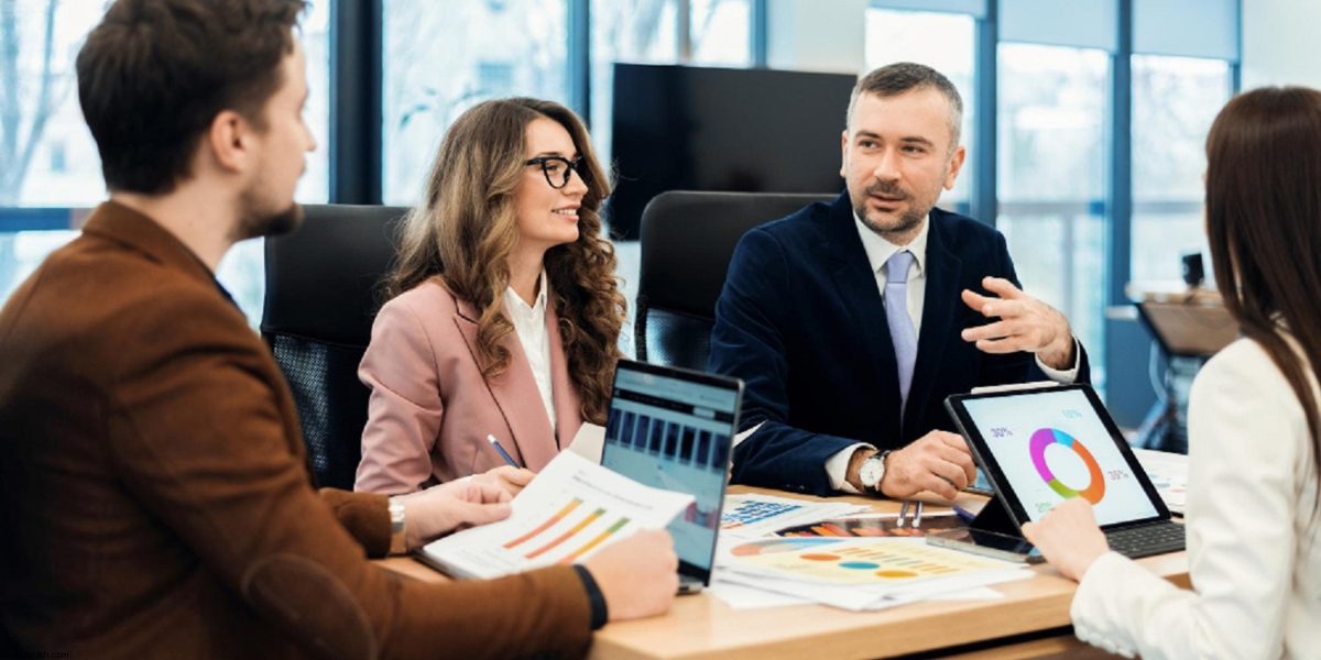 Onwardpath team reviewing digital experience strategy and platform data