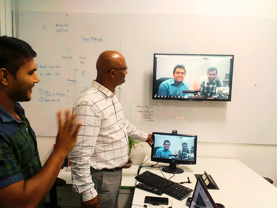Chennai delivery center team on a cross-team video call, 2014