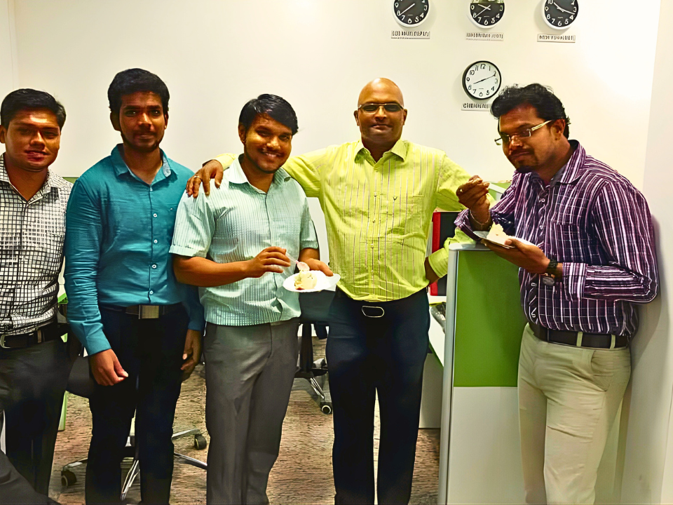 Team celebrating a milestone at the Chennai office, 2014